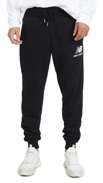 New Balance Essentials Stacked Logo Sweatpants In Black