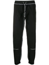 UNITED STANDARD INSIDE-OUT EFFECT TRACK PANTS