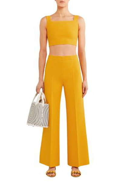 Alaïa Cropped Knitted Wide-leg Pants In Marigold