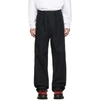 RAF SIMONS RAF SIMONS NAVY HEROES AND LOSERS WIDE FIT TROUSERS