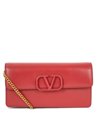 Valentino Garavani V-sling Leather Clutch Bag In Rock Pink