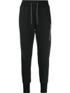 THE NORTH FACE PRINTED LOGO TRACK PANTS