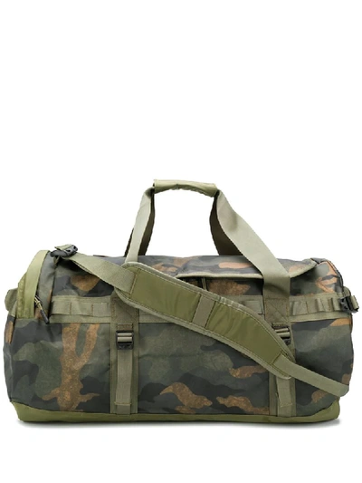 The North Face Camouflage-print Duffle Bag In Green