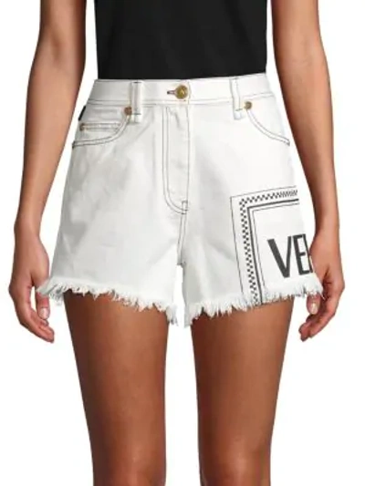 Versace Frayed-hem Logo Denim Shorts In Ivory