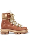 CHRISTIAN LOUBOUTIN YETI DONNA SHEARLING-TRIMMED STUDDED LEATHER ANKLE BOOTS