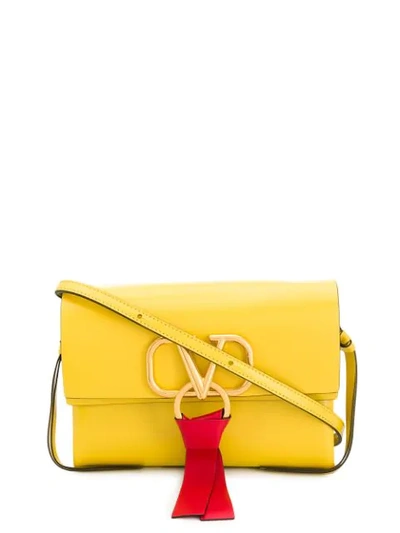 Valentino Garavani V Logo Plaque Crossbody Bag In Yellow