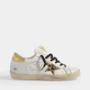 GOLDEN GOOSE Superstar Trainers in White and Gold Leather with Leopard Printed Star