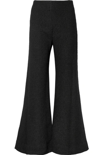 Deitas Venus Wool-blend Bouclé Flared Trousers In Black