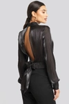 AFJ X NA-KD OPEN BACK TIE DETAIL BLOUSE - BLACK