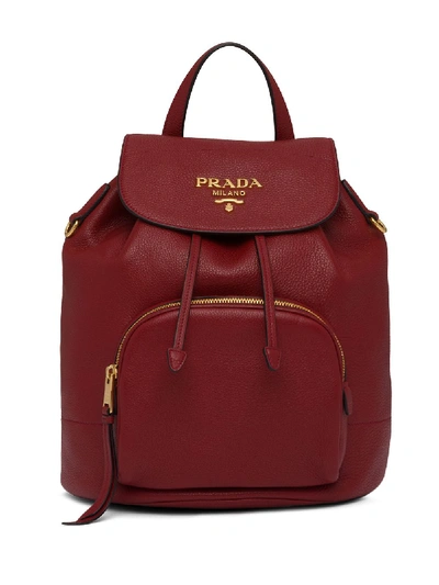 Prada Pebbled Leather Logo Backpack In Red