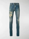 SAINT LAURENT RIPPED-DETAIL SKINNY JEANS,578962YA50713812936