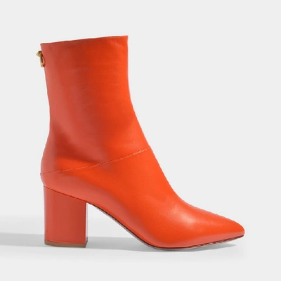 Valentino Garavani Ringstud Mid-heeled Ankle Boots In Orange Leather In Bright Orange