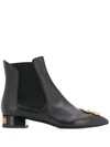 MOSCHINO DOLLAR SIGN PLAQUE ANKLE BOOTS