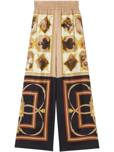 Burberry Montage Print Flared Trousers In Brown