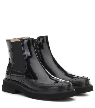 Tod's Embossed Pebbles Ankle Boots In Black