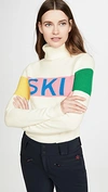 Perfect Moment Intarsia Merino Wool Turtleneck Sweater In White