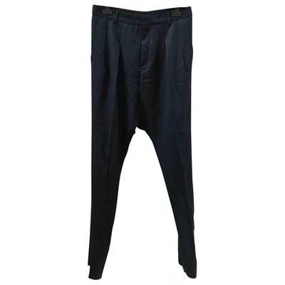 Pre-owned Givenchy Wool Trousers In Black