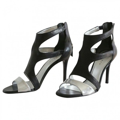 Pre-owned Sandro Sandals In Black