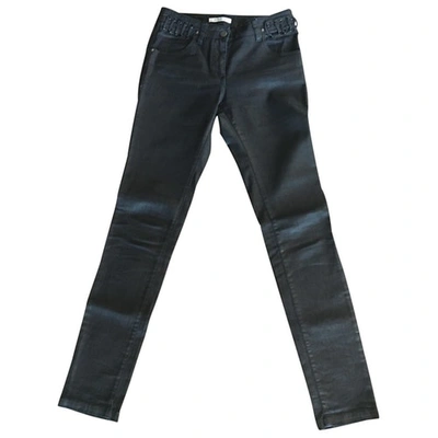 Pre-owned Givenchy Coated Canvas Jeans In Black