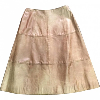 Pre-owned Chanel Leather Mid-length Skirt In Gold