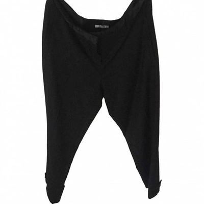 Pre-owned Miu Miu Wool Trousers In Black