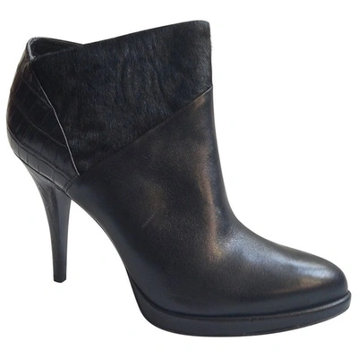 Pre-owned Aerin Pony-style Calfskin Ankle Boots In Black