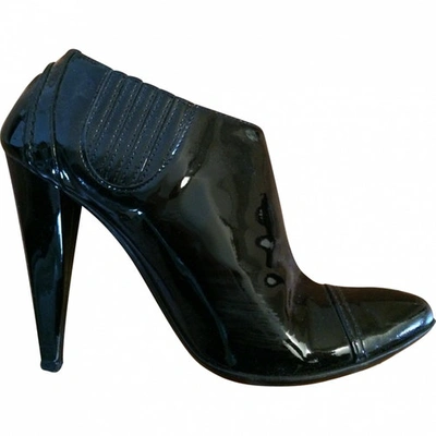 Pre-owned Just Cavalli Patent Leather Ankle Boots In Black