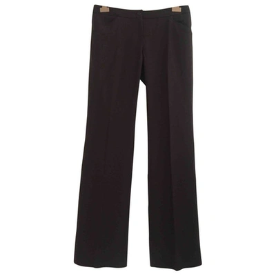Pre-owned Dolce & Gabbana Wool Trousers In Burgundy