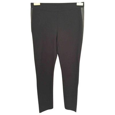 Pre-owned Dkny Straight Trousers In Black