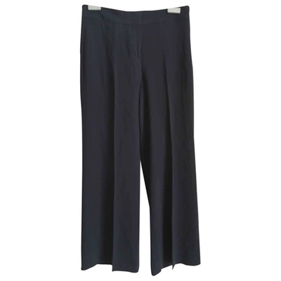 Pre-owned Dkny Straight Trousers In Blue