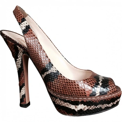 Pre-owned Prada Python Print Heels In Brown