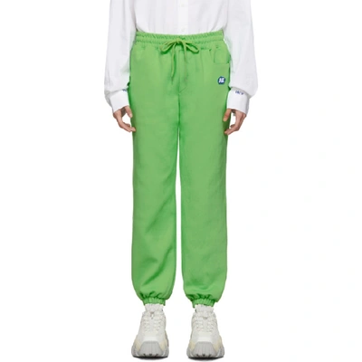 Ader Error Green Stone Logo Lounge Trousers In Negr Neon G