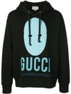 Gucci Manifesto Printed Hoodie In Black
