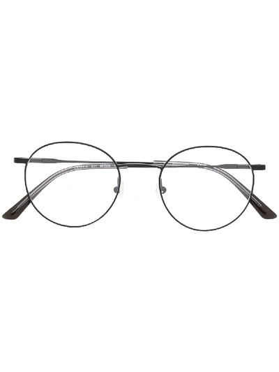 CALVIN KLEIN ROUND FRAME GLASSES