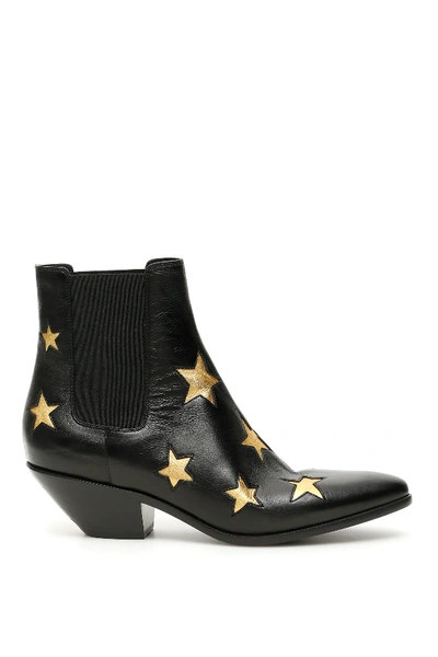 Saint Laurent Star Embossed Ankle Boots In Black,gold