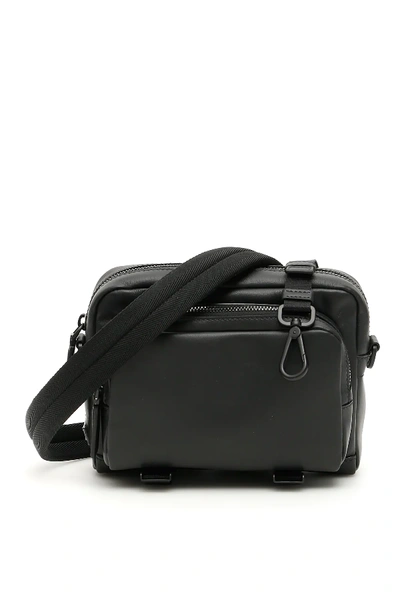 Prada Leather Messenger Bag In Black