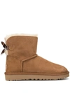 Ugg Bow Snow Boots In Brown