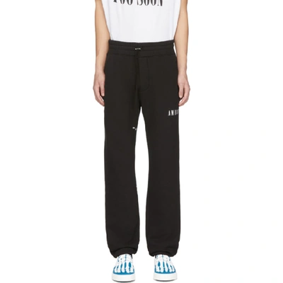 Amiri Tapered Printed Loopback Cotton-jersey Sweatpants In Black