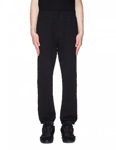 The Row Olin Cuffed-ankle Cotton Track Pants In Black