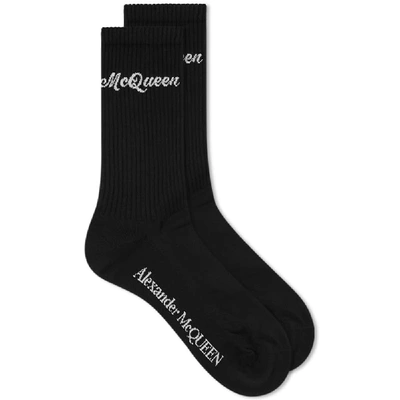 Alexander Mcqueen Ribbed Logo-intarsia Stretch Cotton-blend Socks In Black,ivory