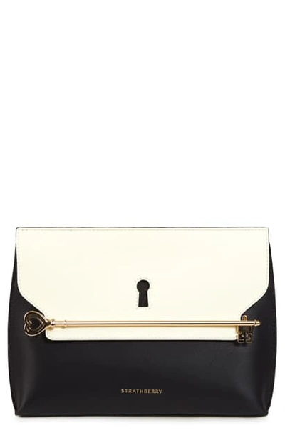 Strathberry East/west Stylist Keyhole Leather Clutch In Black/ Vanilla