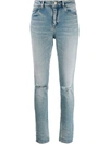 SAINT LAURENT HIGH RISE RIPPED KNEE JEANS