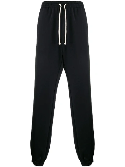 Gucci Loose Technical Jersey Track Pants In Schwarz