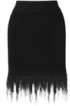 BALMAIN FRINGED RIBBED-KNIT MINI SKIRT