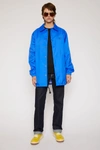 ACNE STUDIOS Face-print coach jacket Electric blue