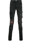 Amiri Distressed Skinny Jeans In 黑色