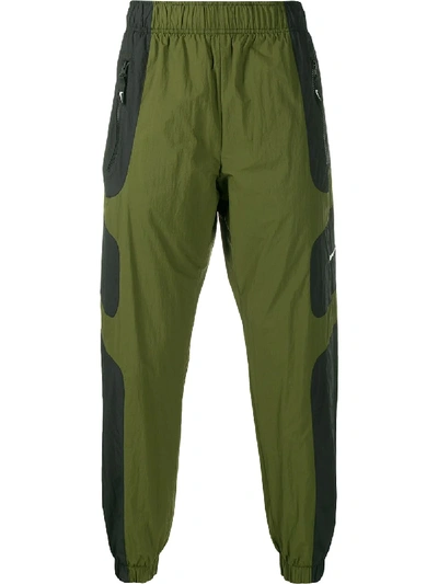 Nike Panelled Swoosh Logo Track Pants In 绿色