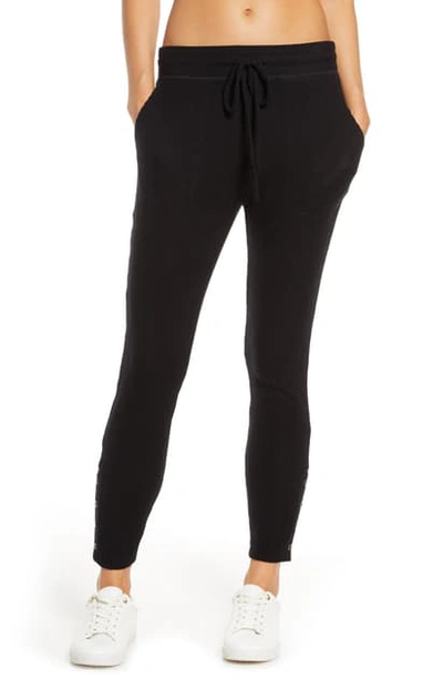 Beyond Yoga Cozy Fleece Fold-over Jogger Sweatpants In Black