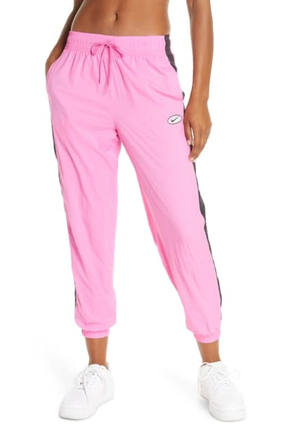 Nike Swoosh Woven Pants In China Rose