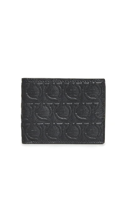 Ferragamo Embossed Gancini Pattern Wallet In Black